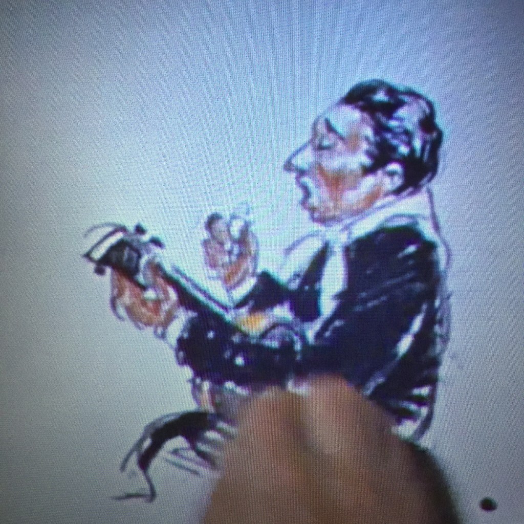 The artist sketches the scene before them.