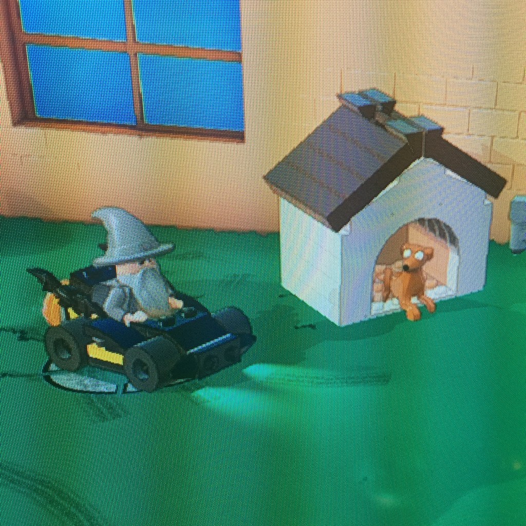 Here we see Gandalf in the Batmobile within The Simpsons world. Hmm, it might be hard to keep all of this straight.